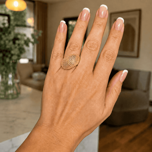 Anillo mujer ondas bañado en oro ajustable texturizado.