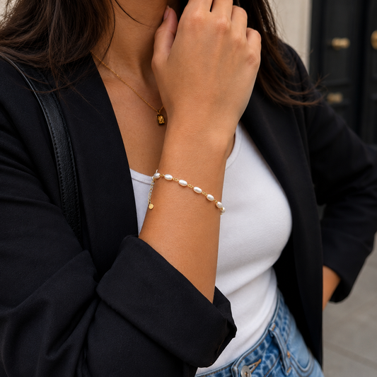 Pulsera de perlas ovaladas bañada en oro con cadena ajustable 24 cm