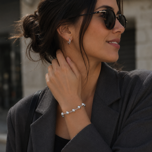 Pulsera de esferas lisas 12 mm bañada en plata ajustable 24 cm